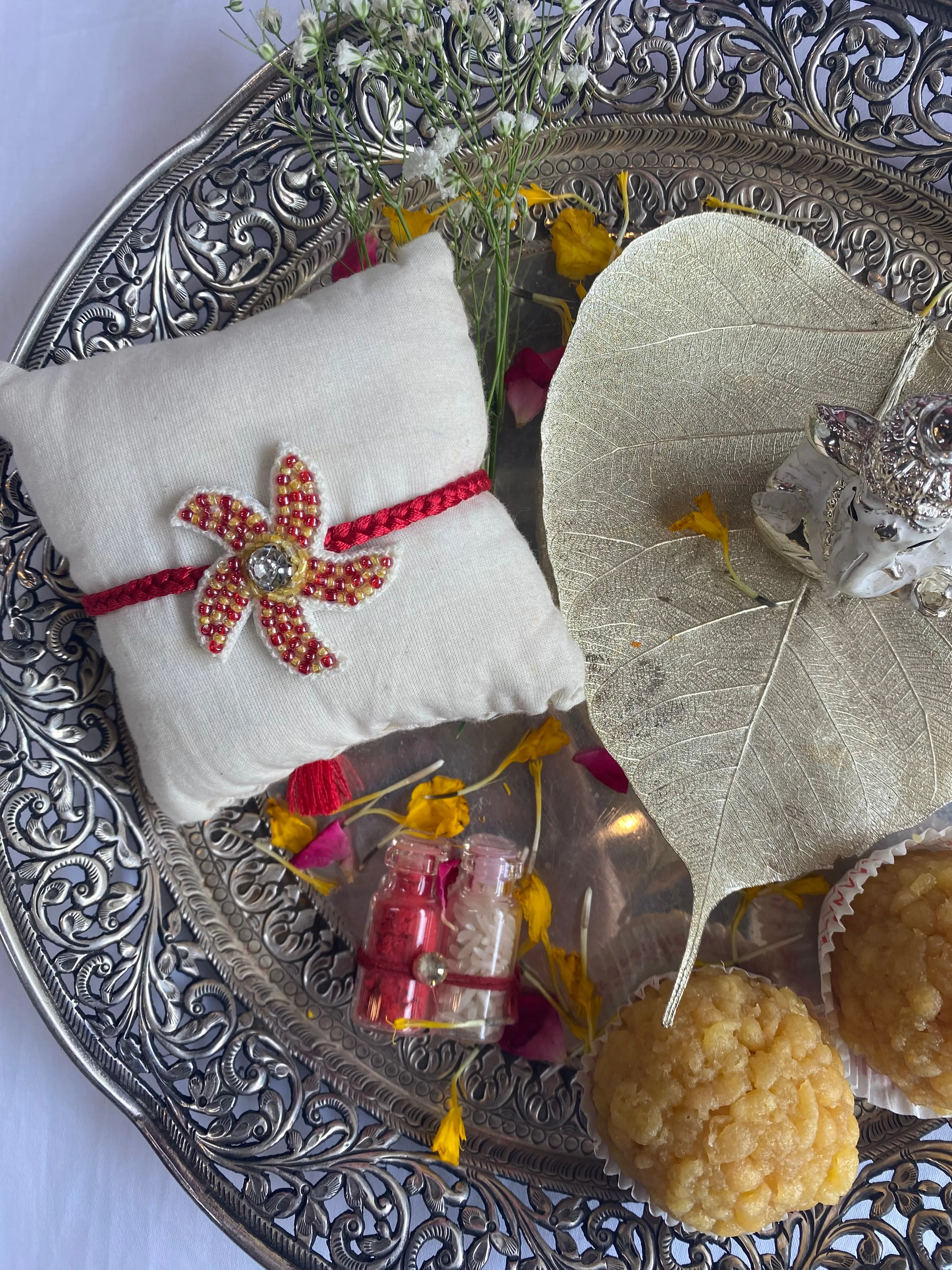 Coral Whirl  Embroidered Rakhi