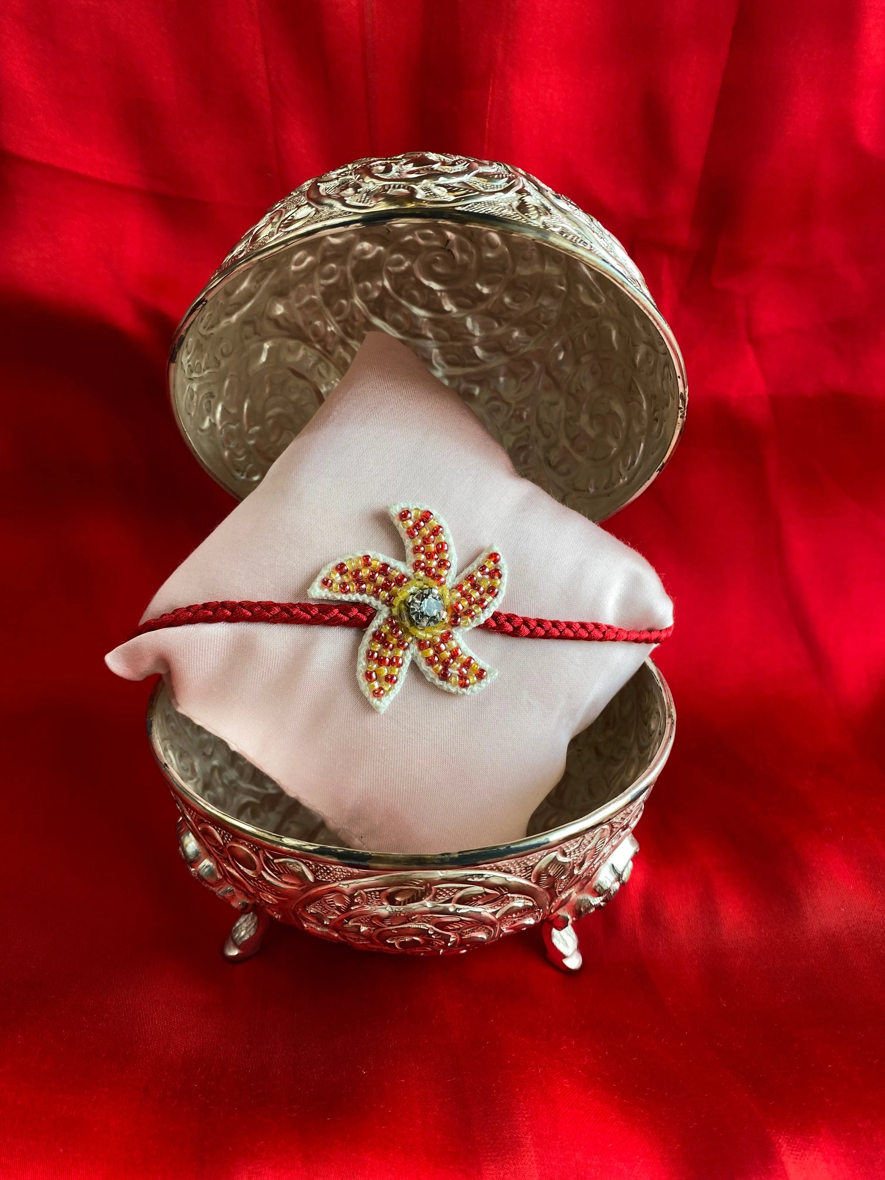 Coral Whirl  Embroidered Rakhi